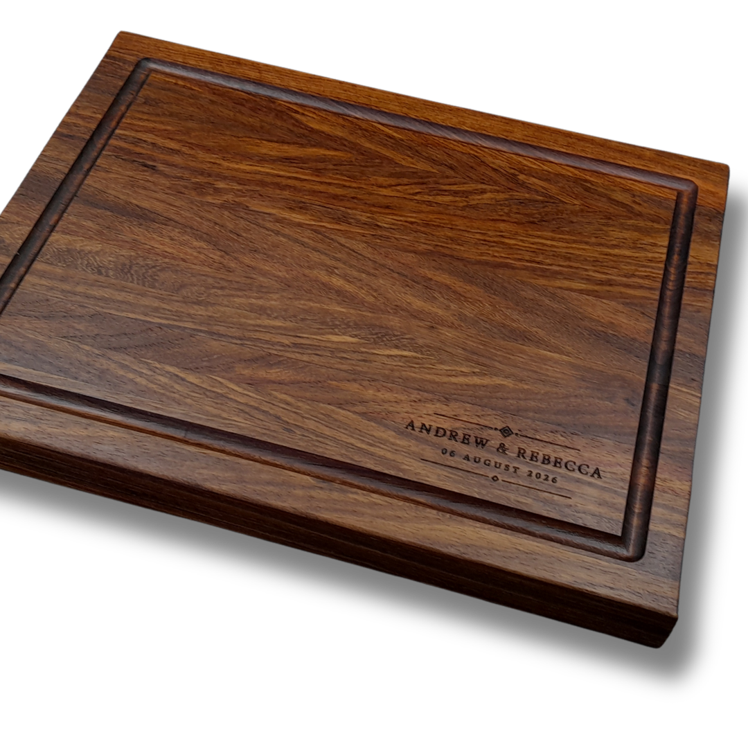 CNC-cut Kiaat hardwood butcher blocks for a corporate order, laid out in the Rustic Worx workshop